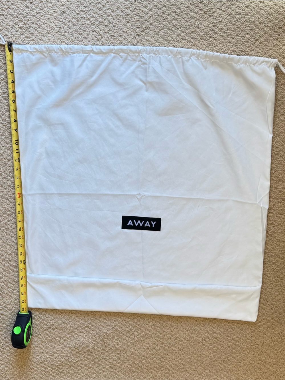Away luggage dust bag would fit any carry on or medium sized bag
